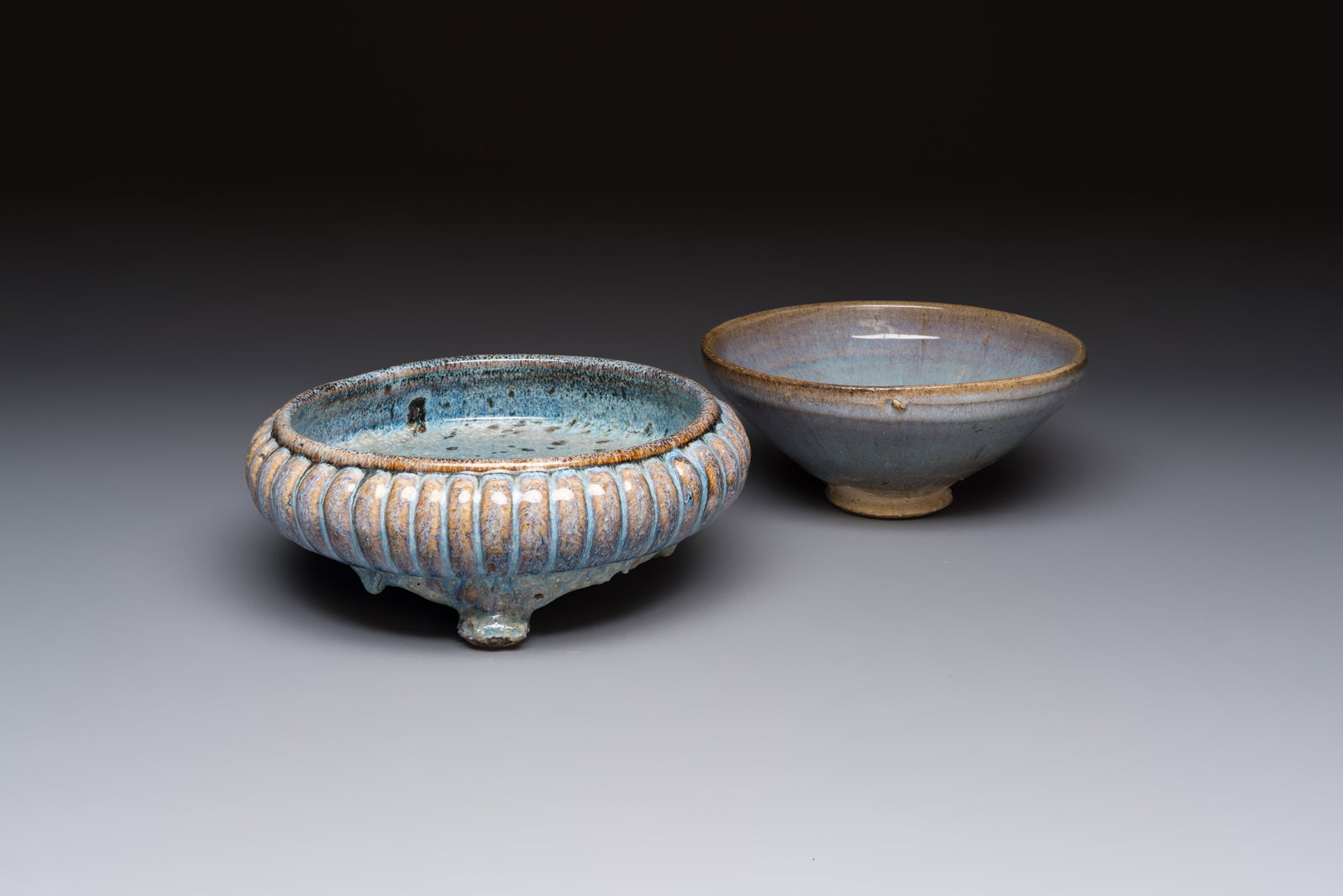 A Chinese Jun-type flambé-glazed tripod censer and a Junyao blue-glazed bowl, 19/20th C. (1 of 7)
