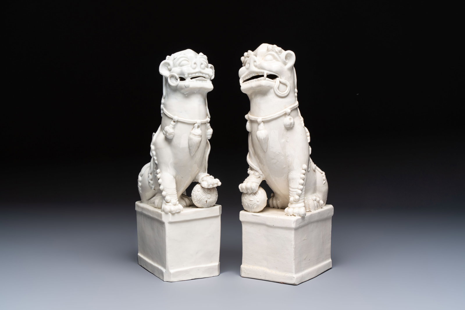 A pair of large Chinese Dehua blanc de Chine Buddhist lion joss stick holders, 19th C. (1 of 7)