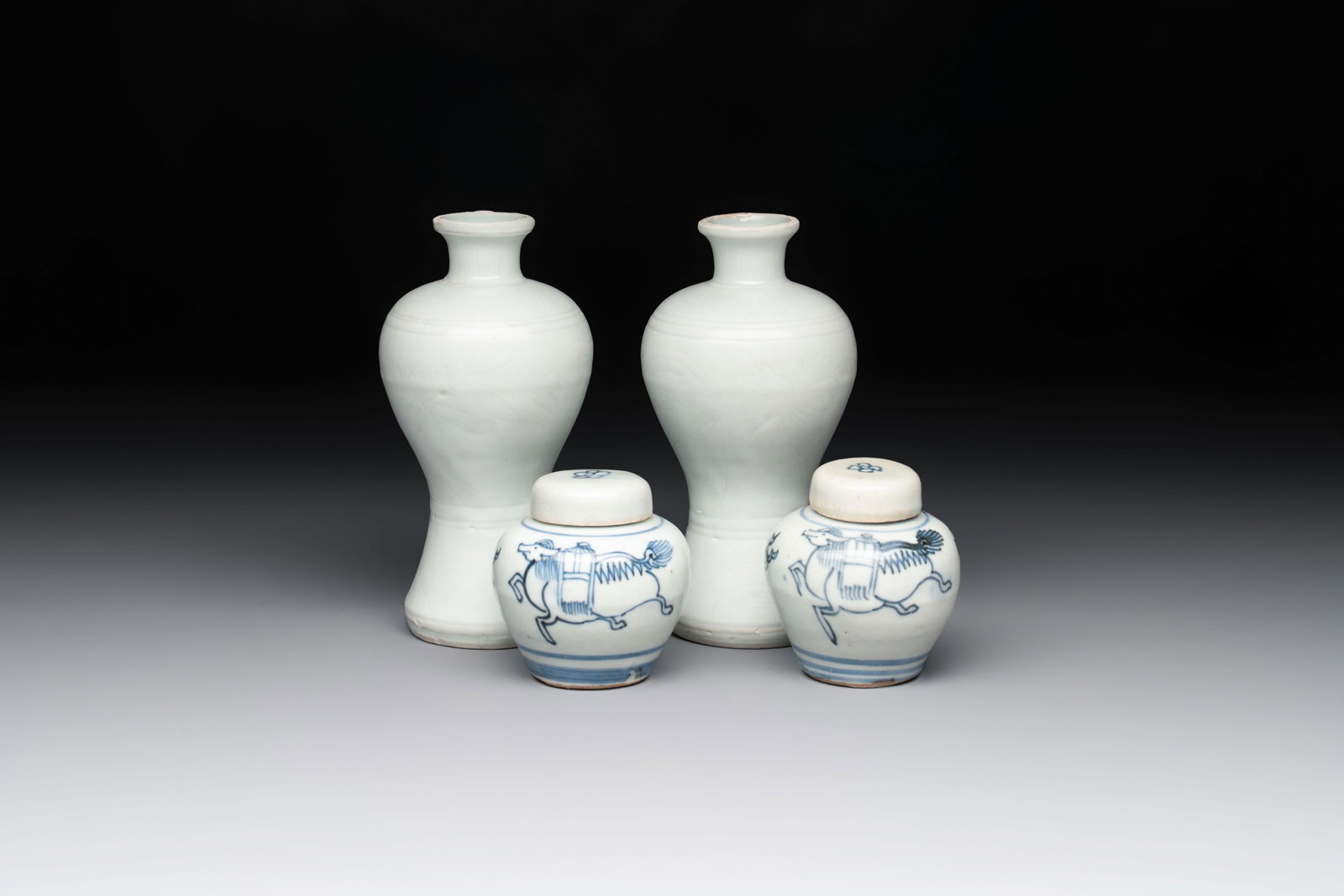 A pair of Chinese incised white-glazed 'Meiping' vases, Wanli mark and of the period, and a pair of (1 of 11)