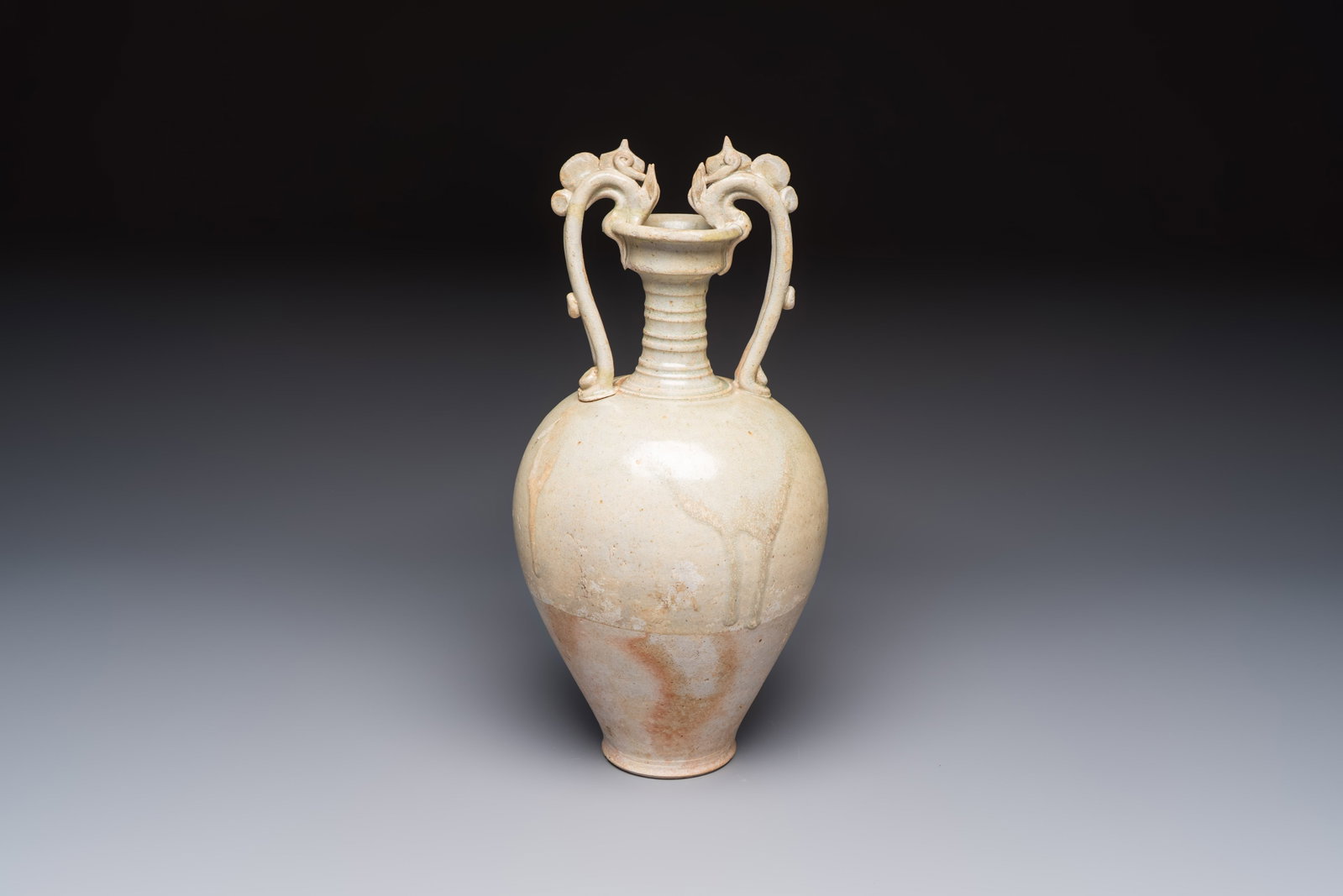 A Chinese straw-glazed pottery amphora with double dragon-shaped handles, Tang: A Chinese straw-glazed pottery amphora with double dragon-shaped handles, Tang H.: 38,3 cm