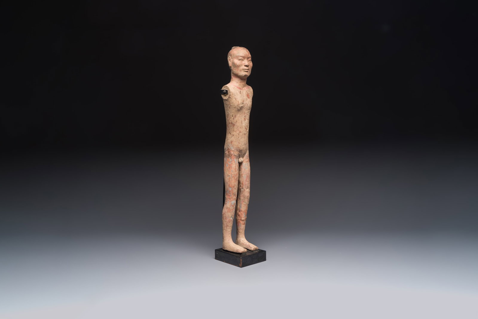 A Chinese cold-painted pottery stick man figure, Han (1 of 7)