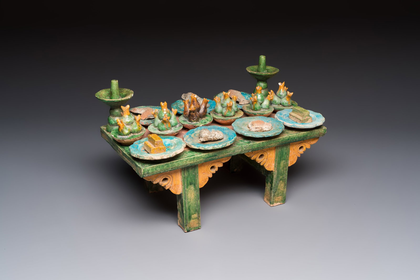 A Chinese sancai-glazed pottery model of an offering table, Ming (1 of 7)