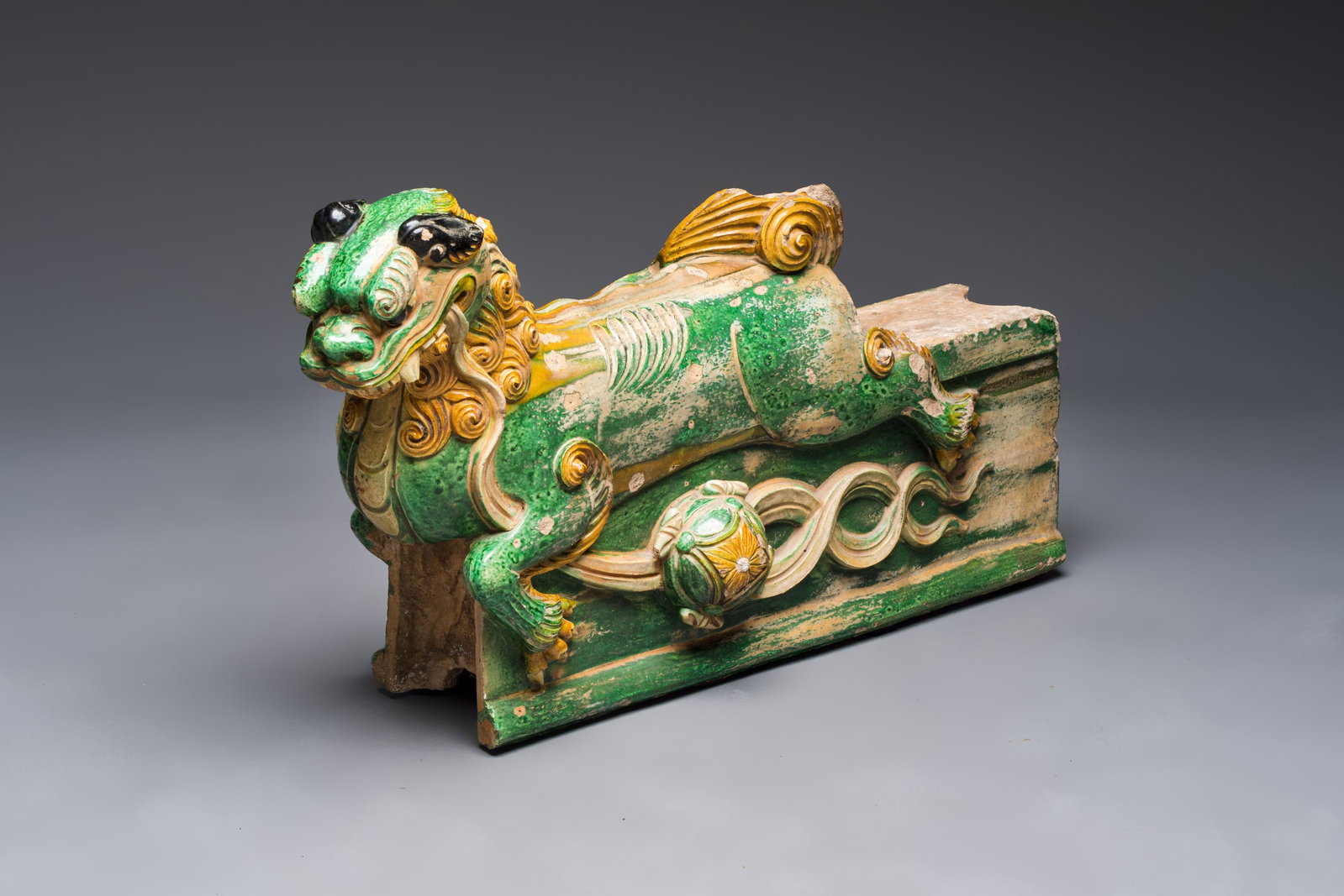 A large Chinese sancai-glazed pottery 'Buddhist Lion' roof tile, Ming (1 of 7)