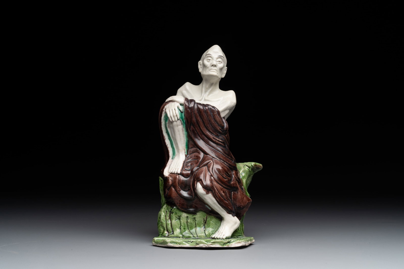 A fine Chinese sancai-glazed figure of a Luohan, Qianlong (1 of 6)