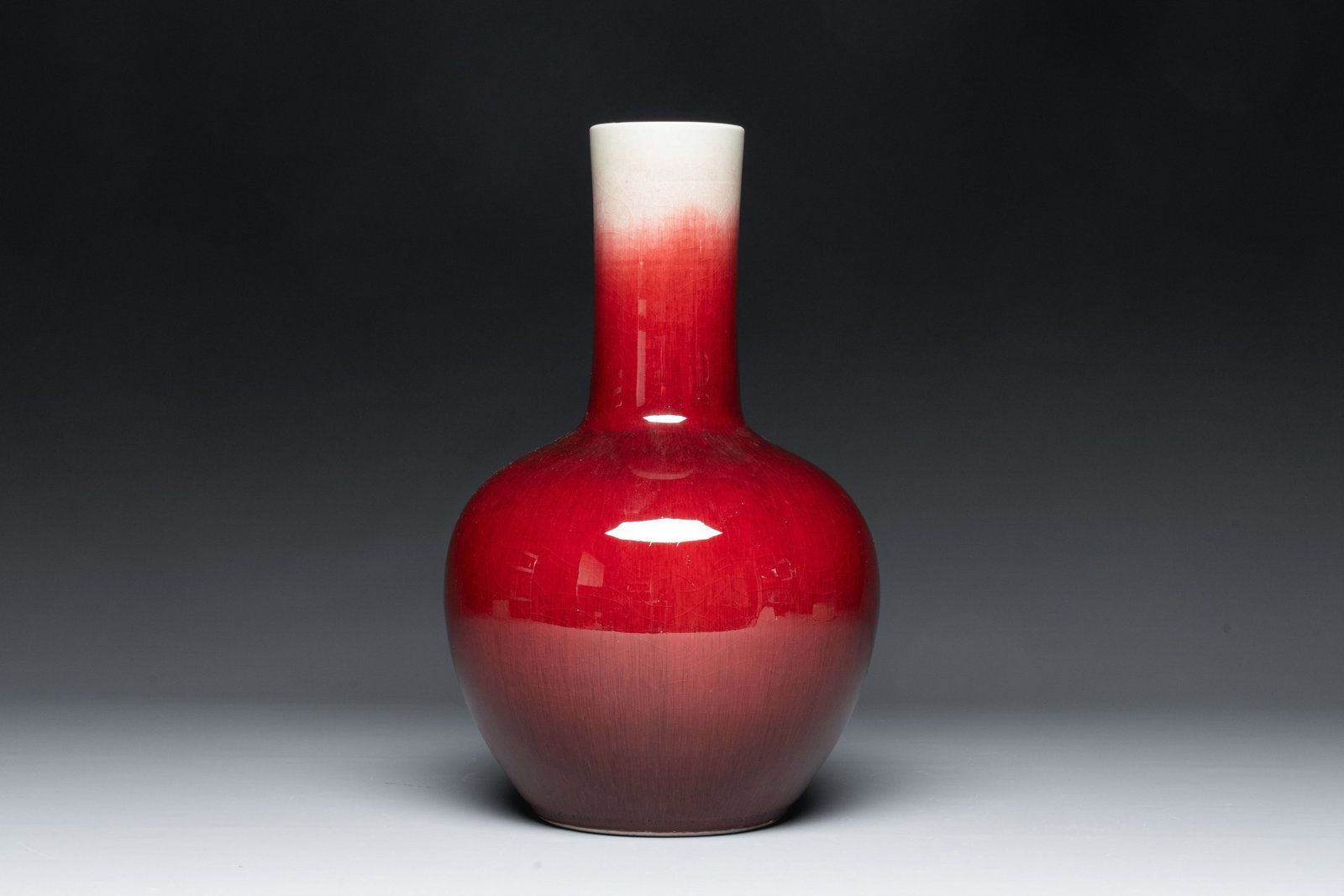 A Chinese copper-red-glazed bottle vase, 20th C. (1 of 4)