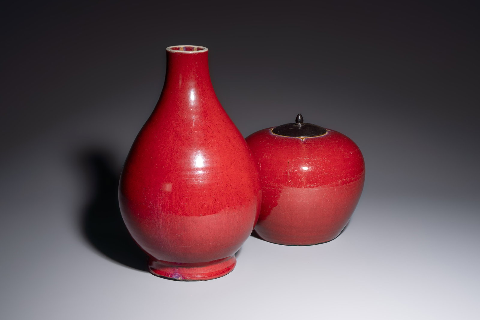A Chinese flambé-glazed vase and a jar with wooden cover, 19th C. (1 of 7)