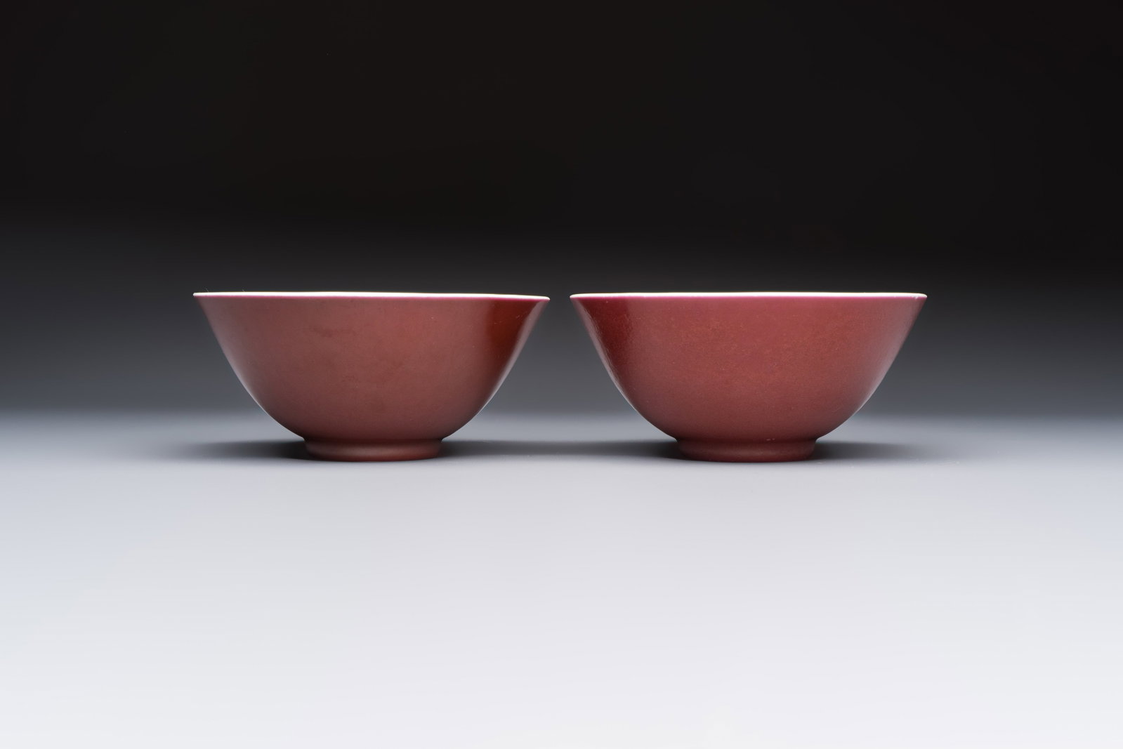 A pair of Chinese copper-red glazed bowls, Guangxu mark and of the period (1 of 6)