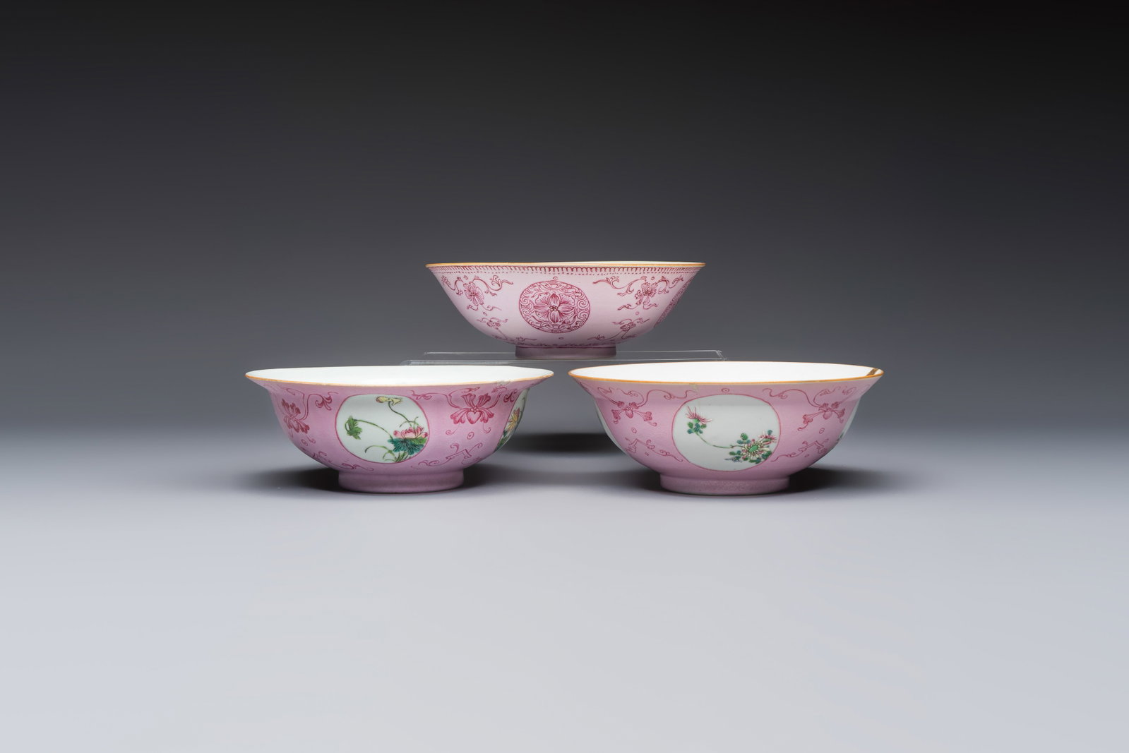 Three Chinese famille rose pink-ground bowls with floral design, Qianlong mark and of the period (1 of 19)