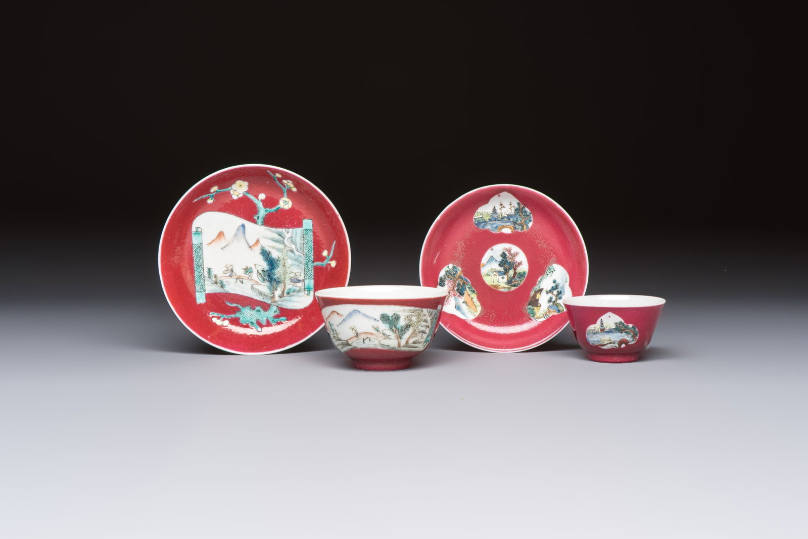 Two Chinese famille rose ruby-ground 'Landscape Scroll' cups and saucers, Yongzheng (1 of 9)