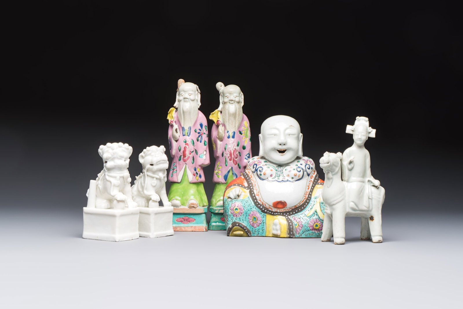 Two Chinese Dehua blanc-de-Chine Buddhist lions, three famille rose figures, and a white-glazed (1 of 19)