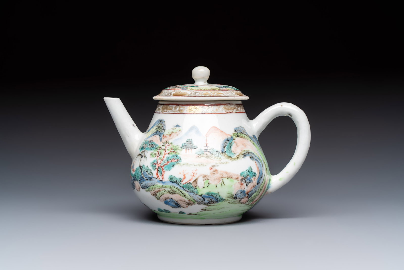 A Chinese famille rose 'Mountainous Landscape' teapot and cover, Yongzheng (1 of 6)