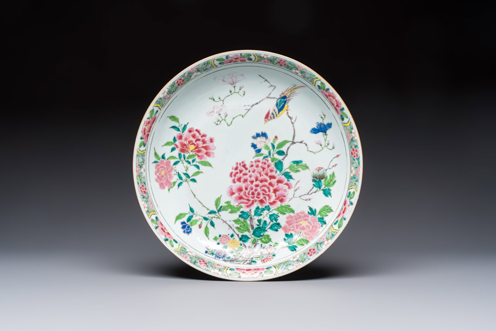 A Chinese famille rose 'Birds among Blossoming Branches' dish, Yongzheng (1 of 2)
