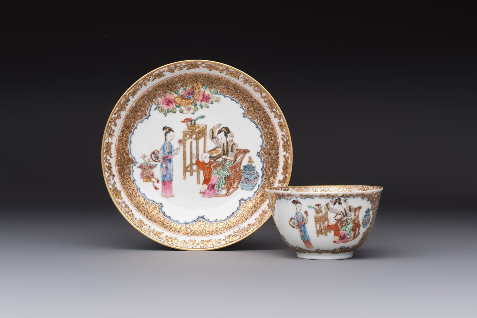A fine Chinese Canton famille rose gilt-decorated cup and saucer with figural design, (1 of 9)