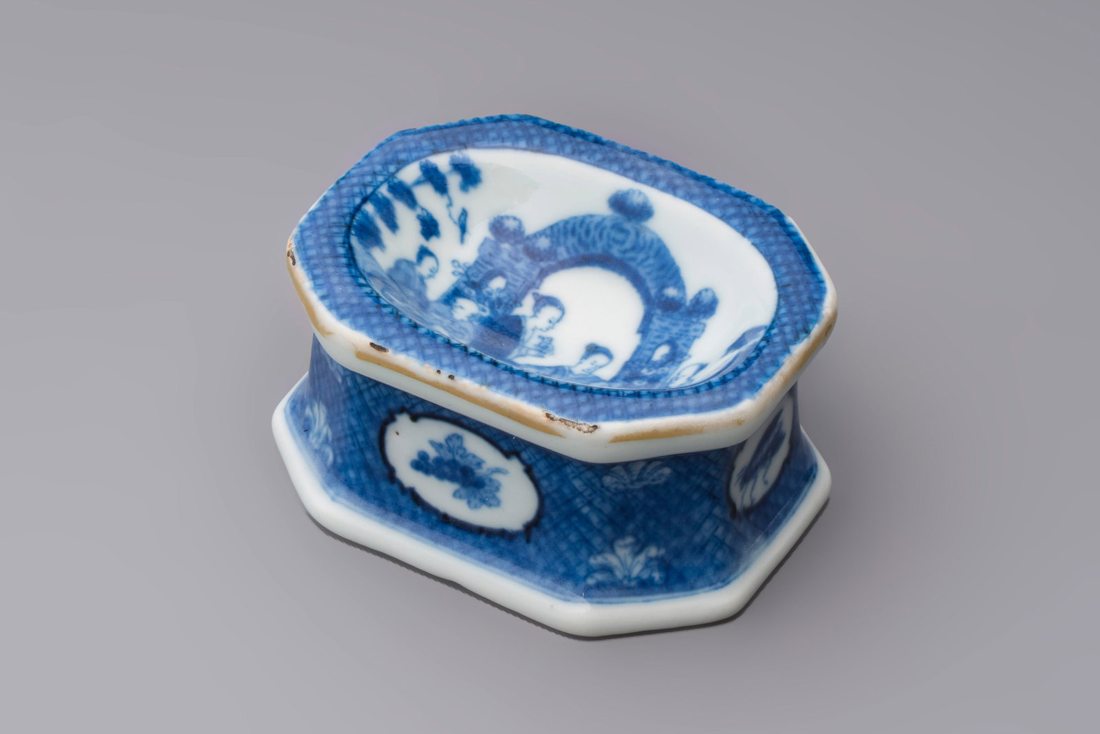 A Chinese blue and white 'Arbour' salt after Cornelis Pronk, Qianlong: A Chinese blue and white 'Arbour' salt after Cornelis Pronk, Qianlong Dim.: 7,7 x 5,8x 4 cm Ref.: -D.S. Howard, J. Ayers, 'China for the West', pp. 292-205 for a discussion on the designs by Pronk.