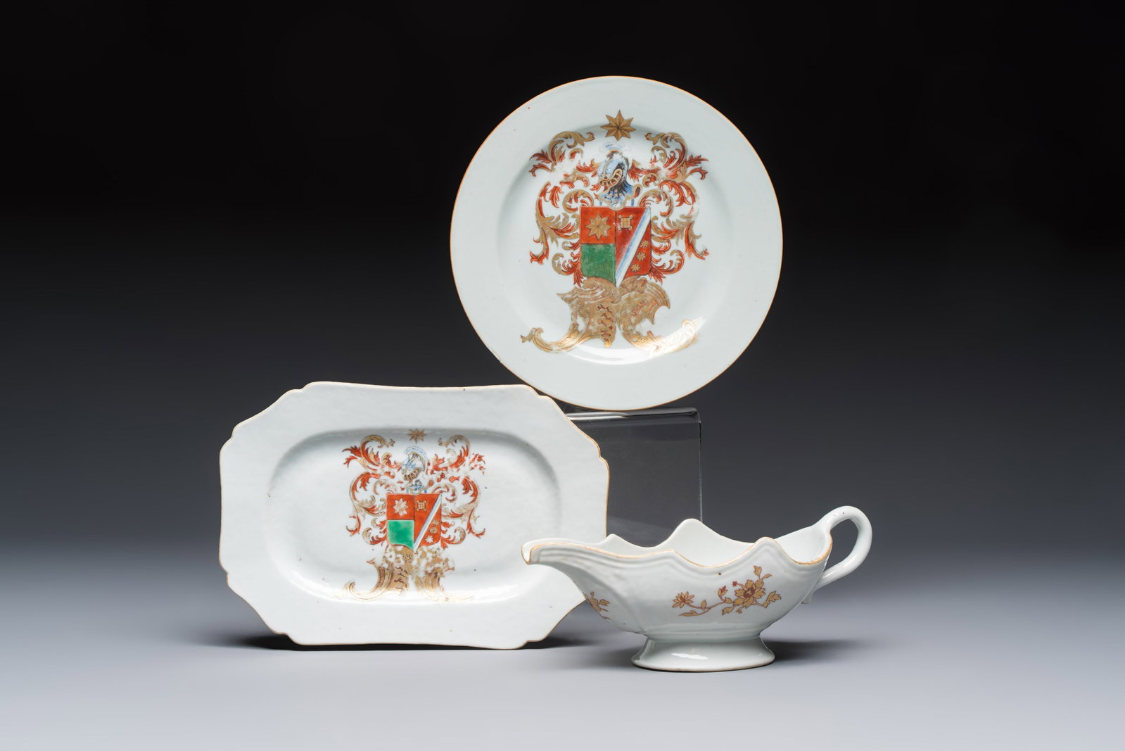 A Chinese armorial plate, a serving dish and a sauce boat with the arms of de Heere for the Dutch (1 of 11)