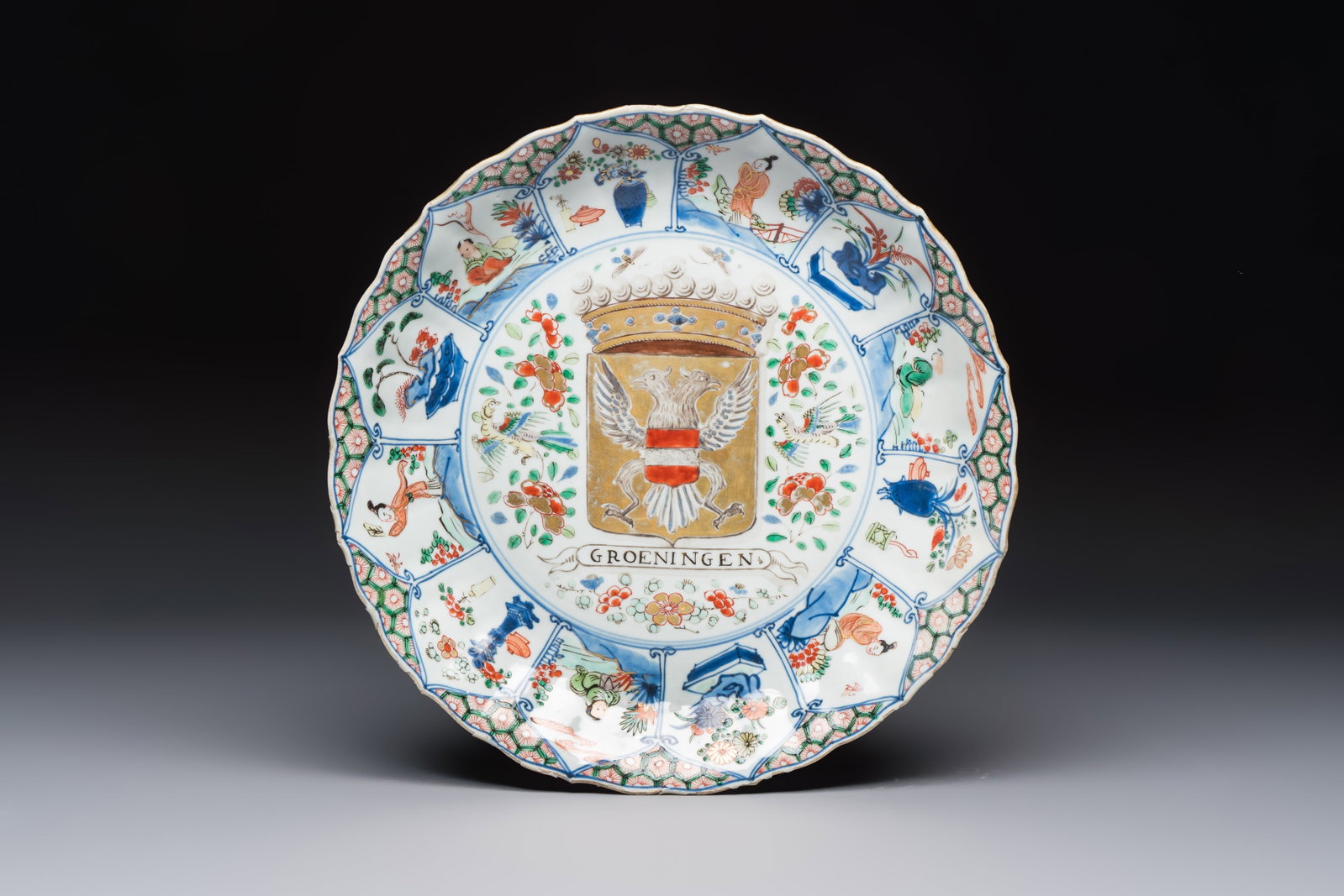 A Chinese famille verte armorial 'Provinces' dish with the arms of Groeningen, Kangxi: A Chinese famille verte armorial 'Provinces' dish with the arms of Groeningen, Kangxi Dia.: 30,9 cm Ref.: - The Groninger Museum, The Netherlands, for an identical example. (object no.1918.0102) - For