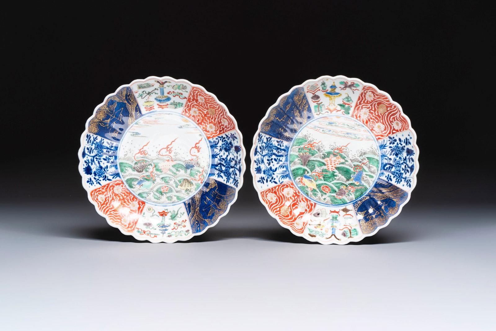 A pair of Chinese famille verte 'Sea Creatures' lobed plates, Kangxi (1 of 2)