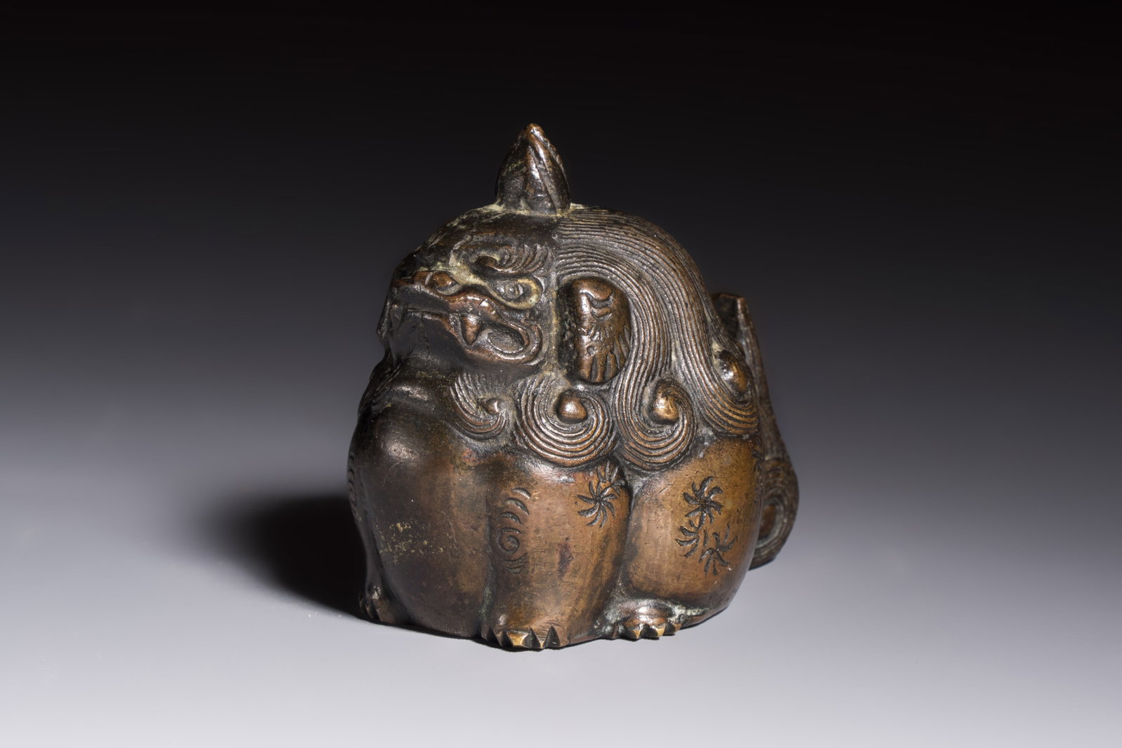 A Japanese bronze 'Shishi' paperWeight, Meiji, 19th C. (1 of 7)