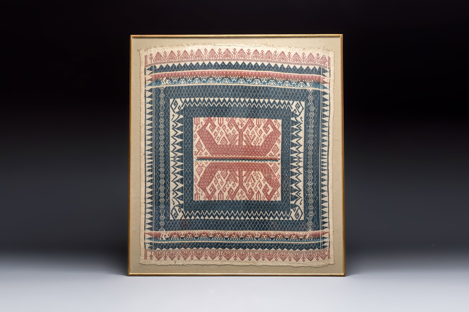 An Indonesian ceremonial 'Tampan' textile, Sumatra, Lampung, late 19/20th C. (1 of 2)