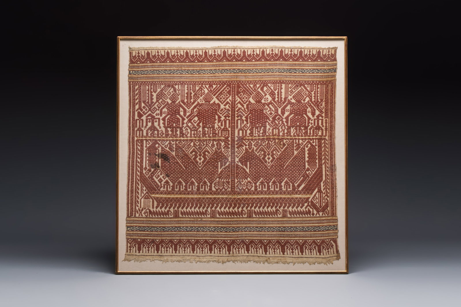 An Indonesian ceremonial 'Tampan' textile, Sumatra, Lampung, late 19/20th C. (1 of 2)