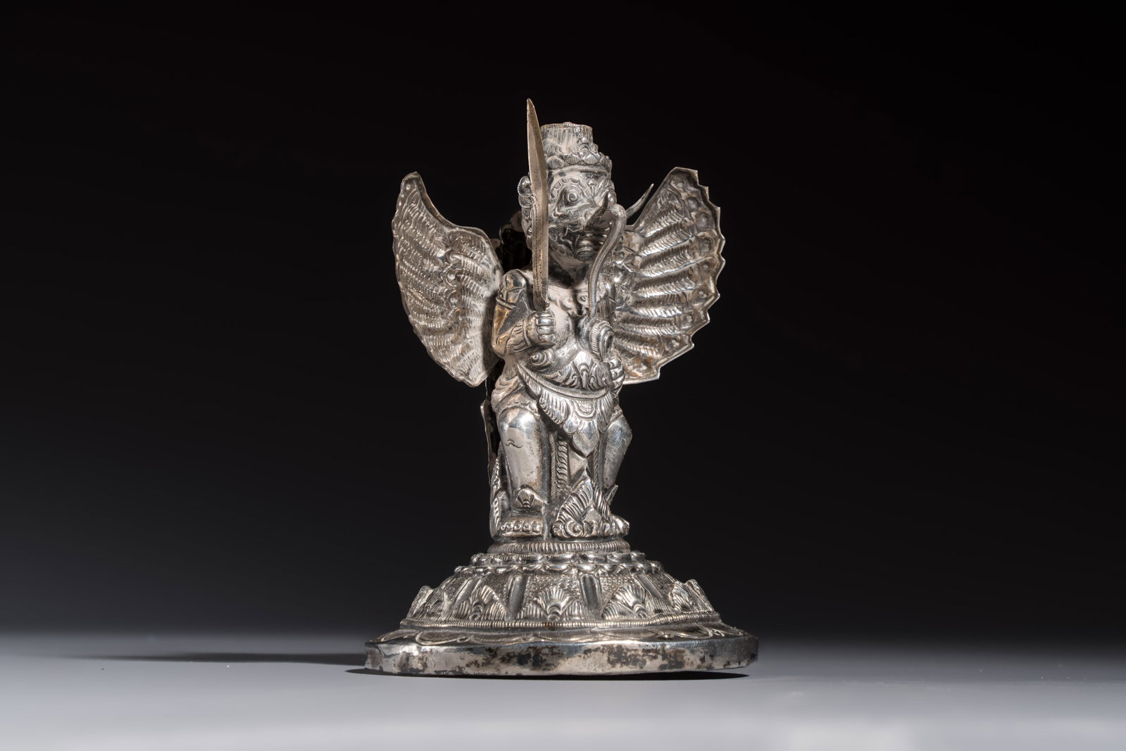 A repoussé silver figure of Garuda, Southeast Asia, 19/20th C. (1 of 7)
