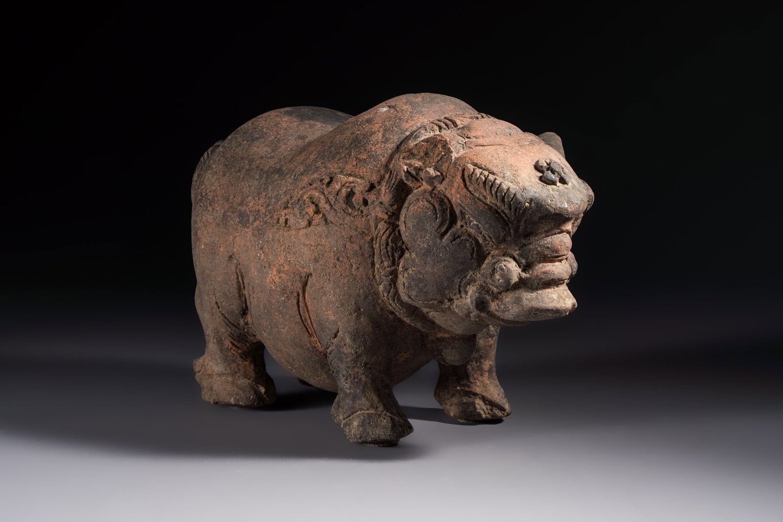 A Javanese terracotta boar-shaped money bank, probably Majapahit Kingdom, 15th C. (1 of 7)