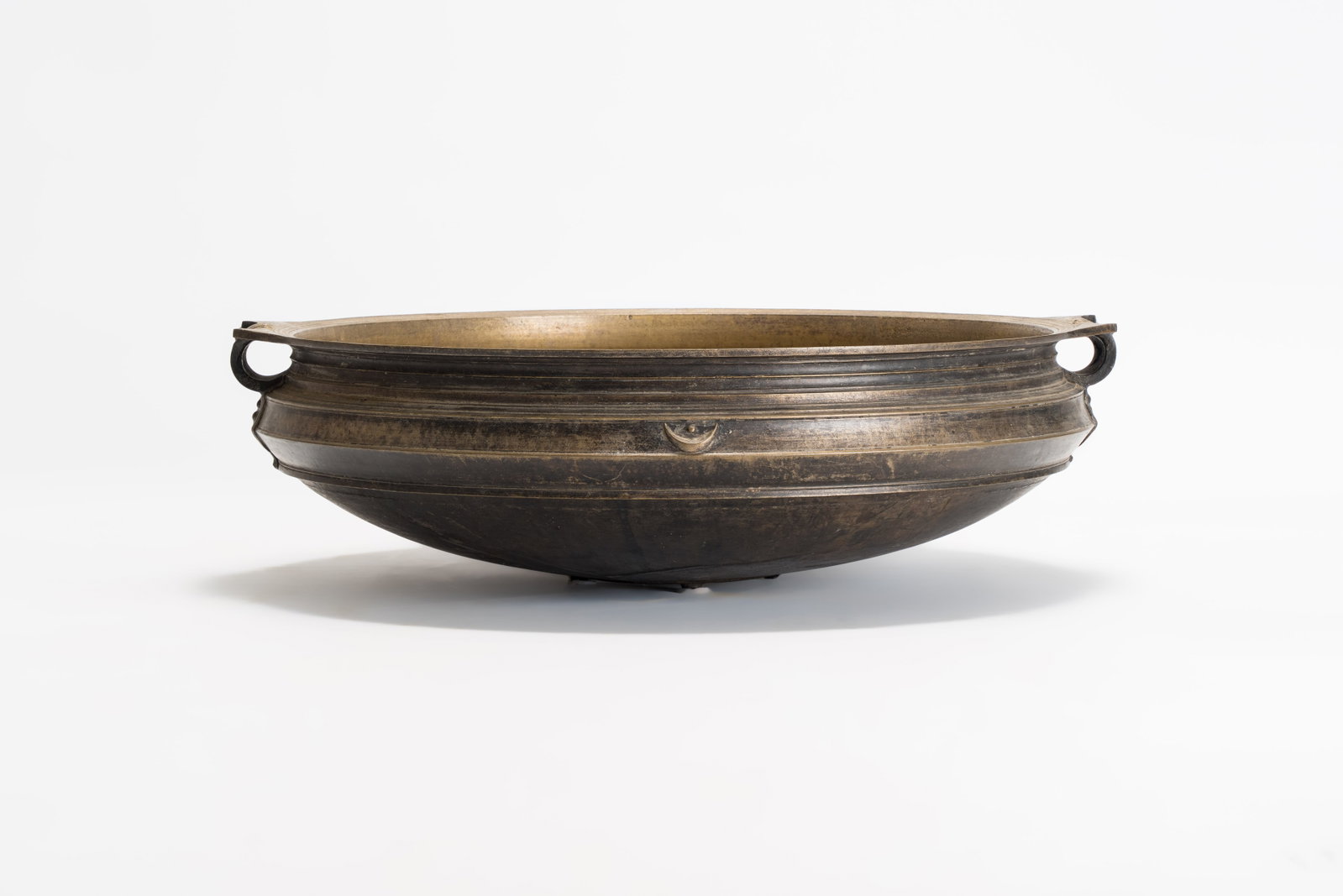 A large bronze temple bowl or 'urli', South India, 19th C. (1 of 6)