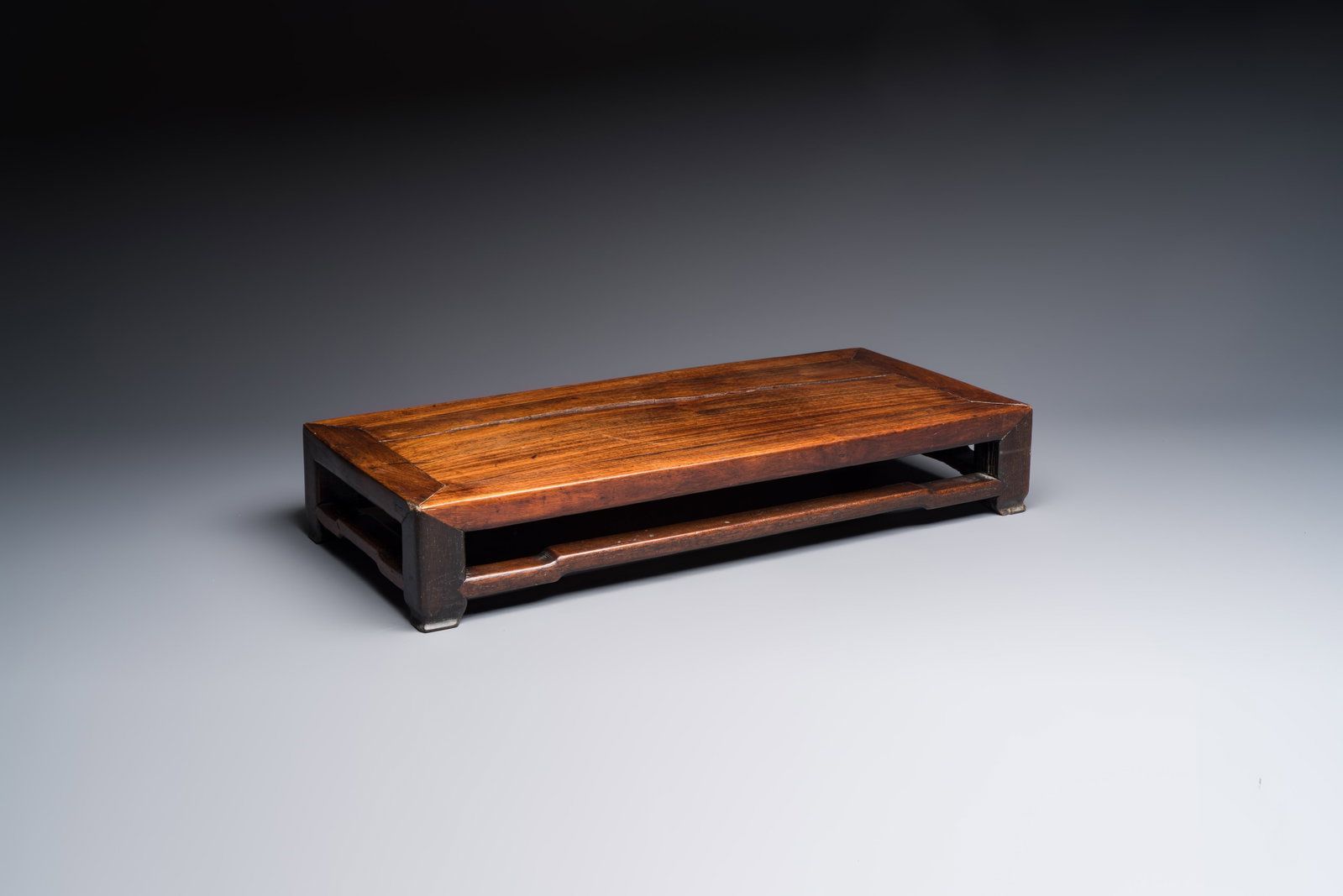 A Chinese rectangular hongmu stand, 19th C. (1 of 7)