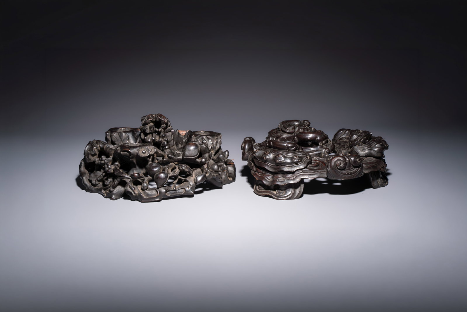 Two large Chinese carved wooden stands, 19th C. (1 of 13)