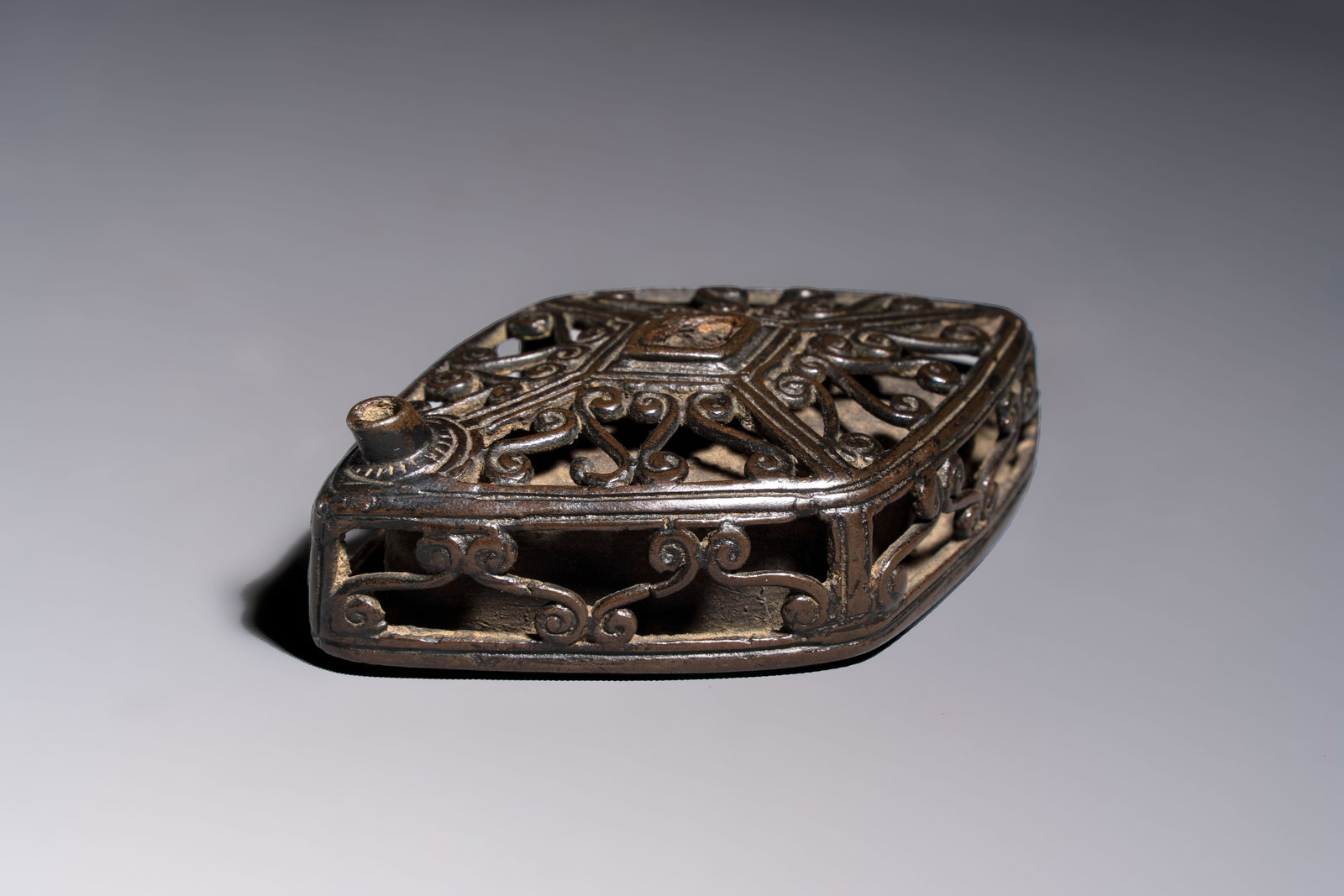A Chinese openworked double-walled lozenge-shaped bronze water dropper, Ming (1 of 7)
