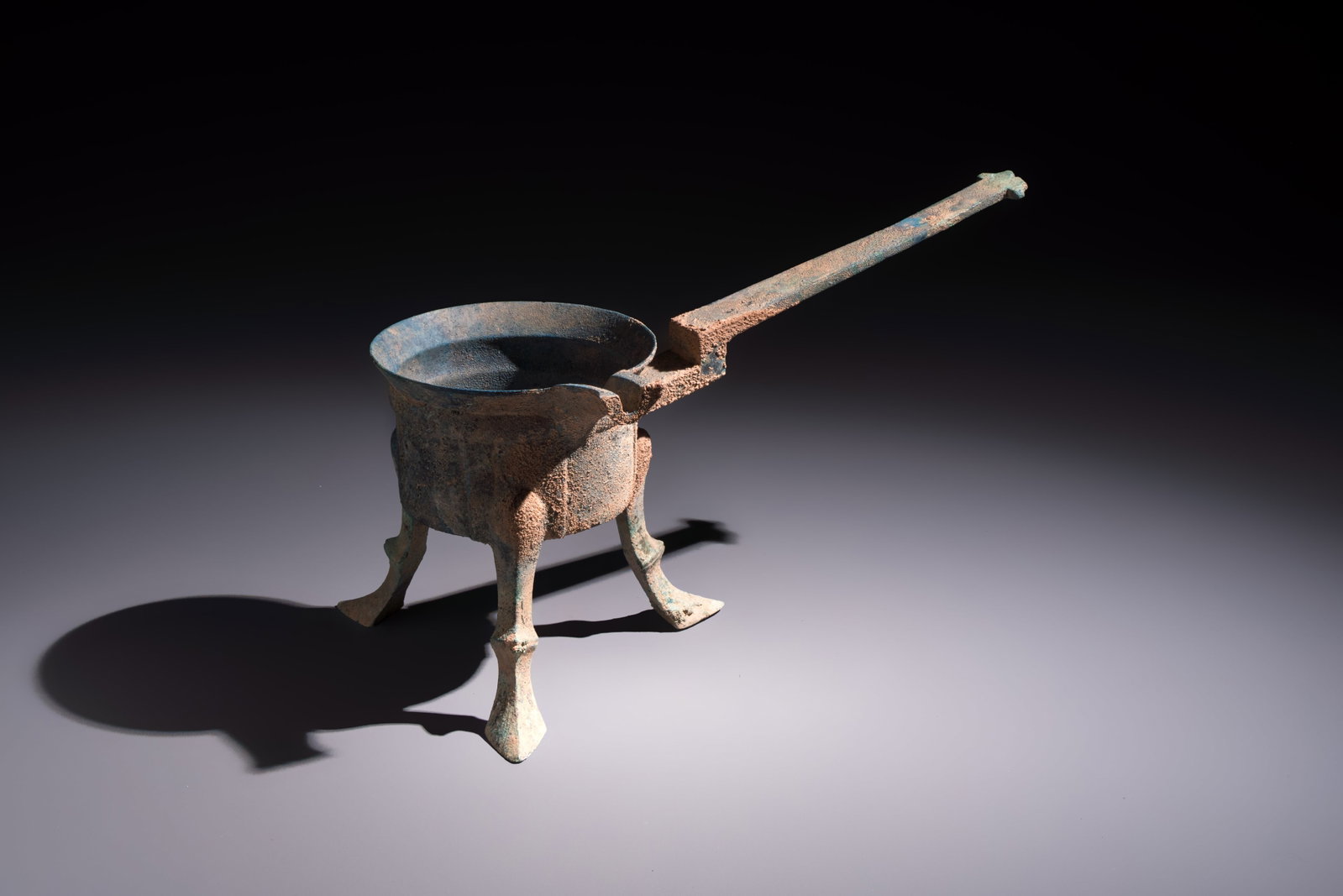 A Chinese archaic bronze food warming vessel, 'Jiao Dou', Han (1 of 7)