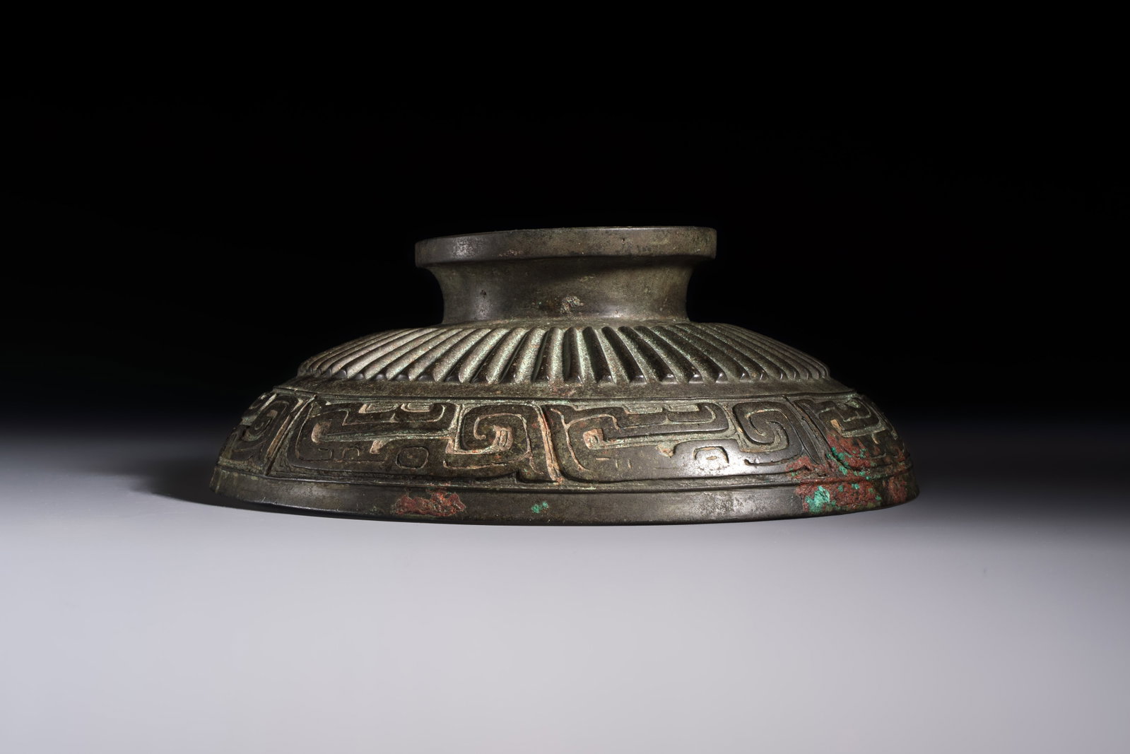 A large Chinese inscribed archaic bronze cover of a 'Gui' vessel, Western Zhou (1 of 6)