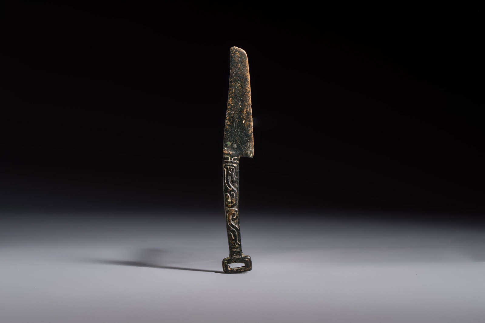 A rare Chinese archaic bronze knife with 'Dragon' design, Western Zhou (1 of 2)