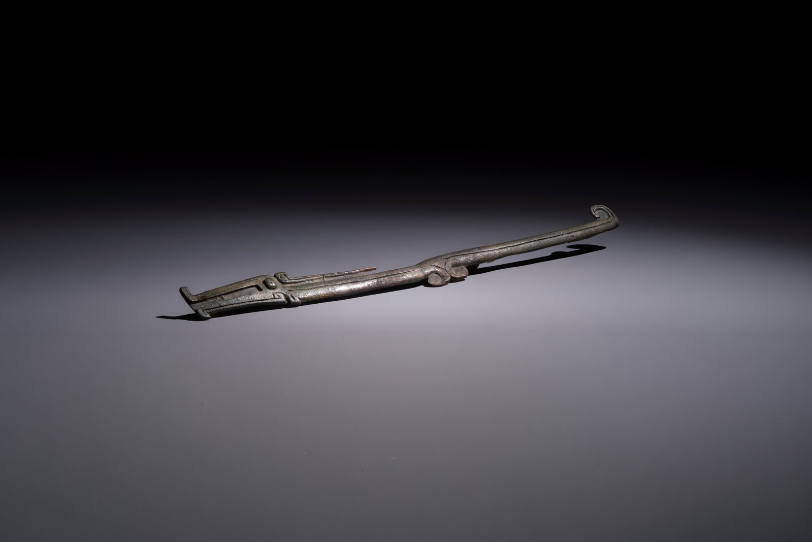 A large Chinese archaic bronze dragon-shaped fitting, early Western Zhou (1 of 3)