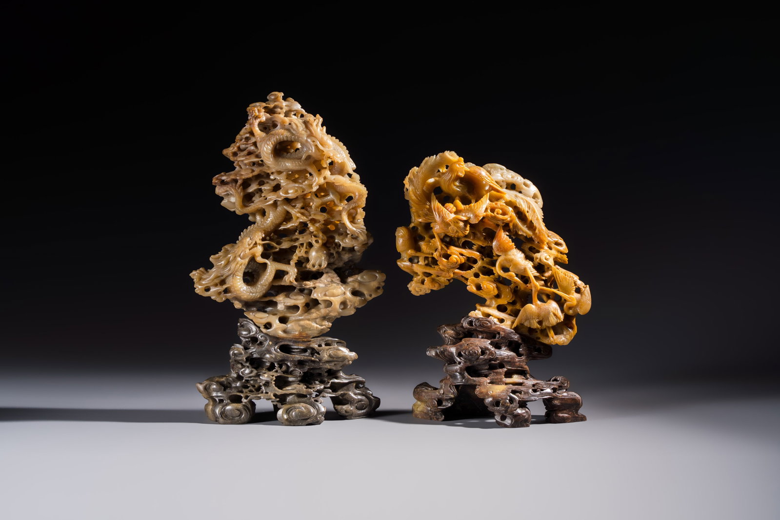 A fine Chinese carved soapstone 'Dragons among Clouds' group and a 'Phoenixes and Cranes' group, (1 of 6)