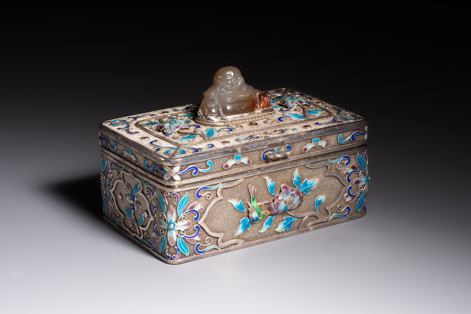 A Chinese enamelled silver rectangular casket adorned with an agate Millefo Buddha, 20th C. (1 of 8)