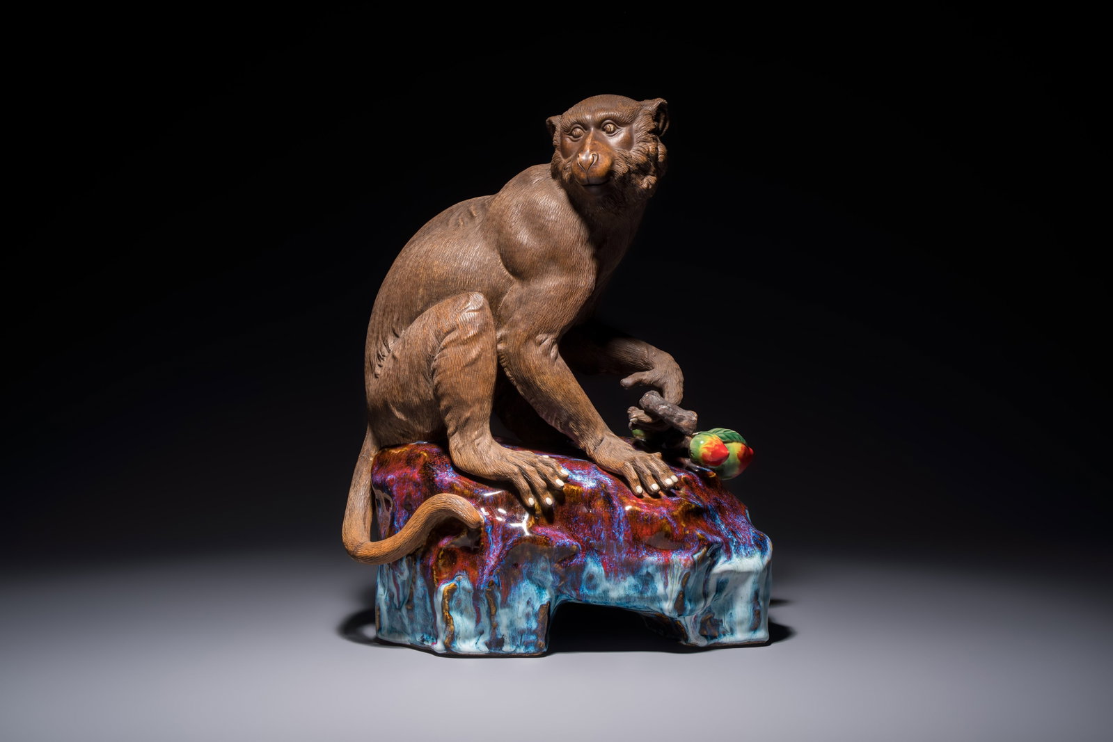 A Chinese polychrome-glazed Shiwan stoneware 'Monkey and Peach' group, signed, 20th C. (1 of 7)