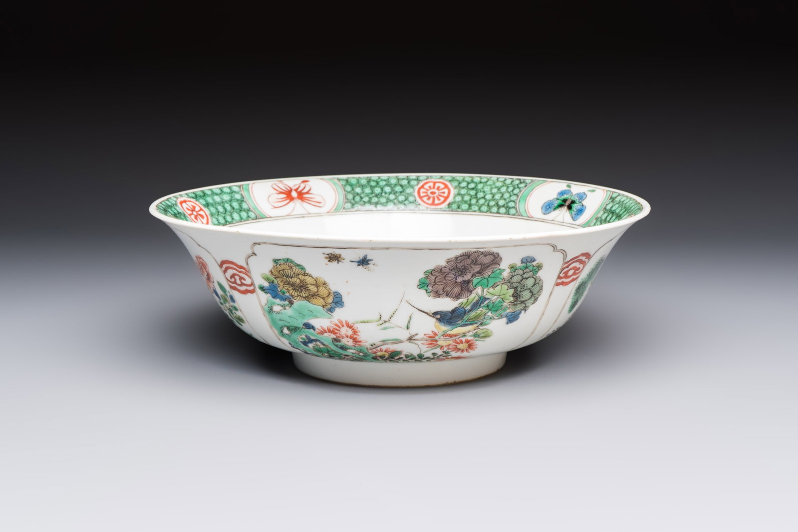 A Chinese famille verte bowl with bird and butterflies among flowers, lozenge mark, Kangxi (1 of 7)