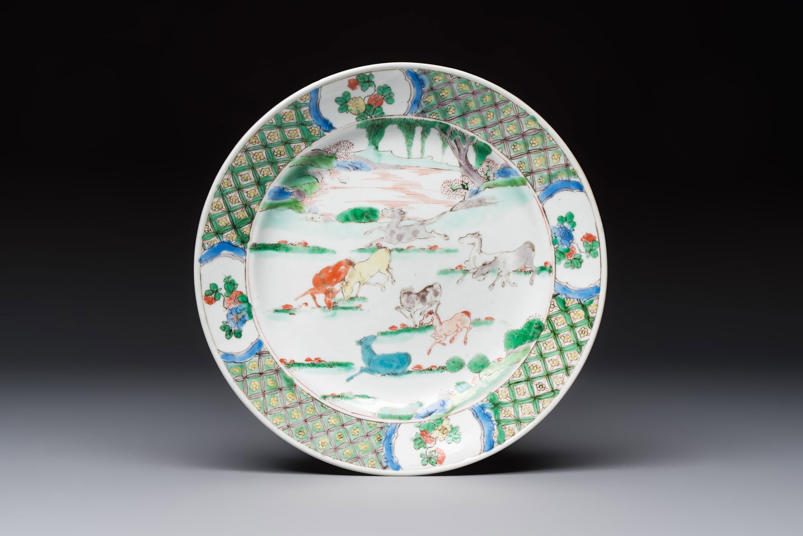 A Chinese famille verte 'Eight Horses' plate, Kangxi: A Chinese famille verte 'Eight Horses' plate, Kangxi Dia.: 21,5 cm