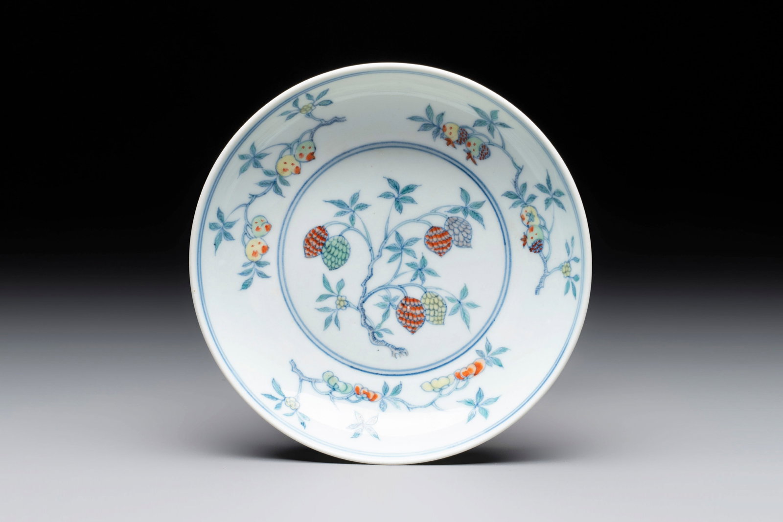 A Chinese doucai 'sanduo' plate, ingot, brush and ruyi mark, Yongzheng: A Chinese doucai 'sanduo' plate, ingot, brush and ruyi mark, Yongzheng Dia.: 16,1 cm