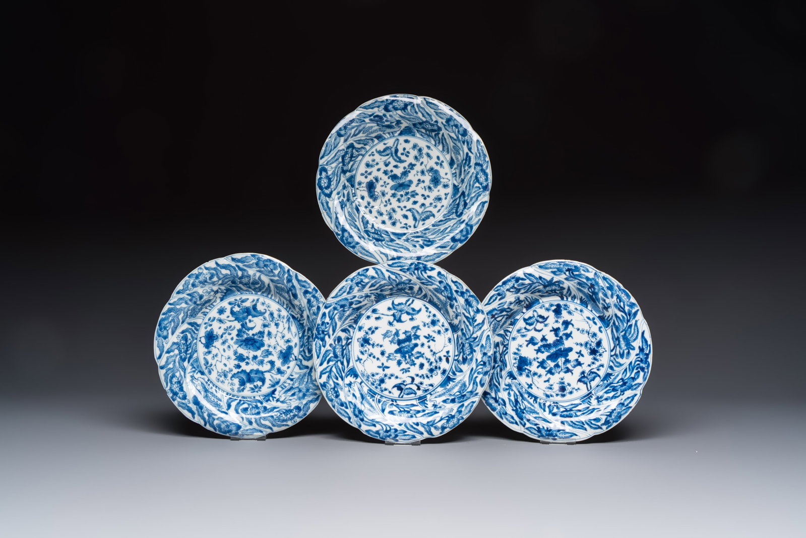 Four Chinese blue and white moulded plates with floral design, Kangxi (1 of 9)