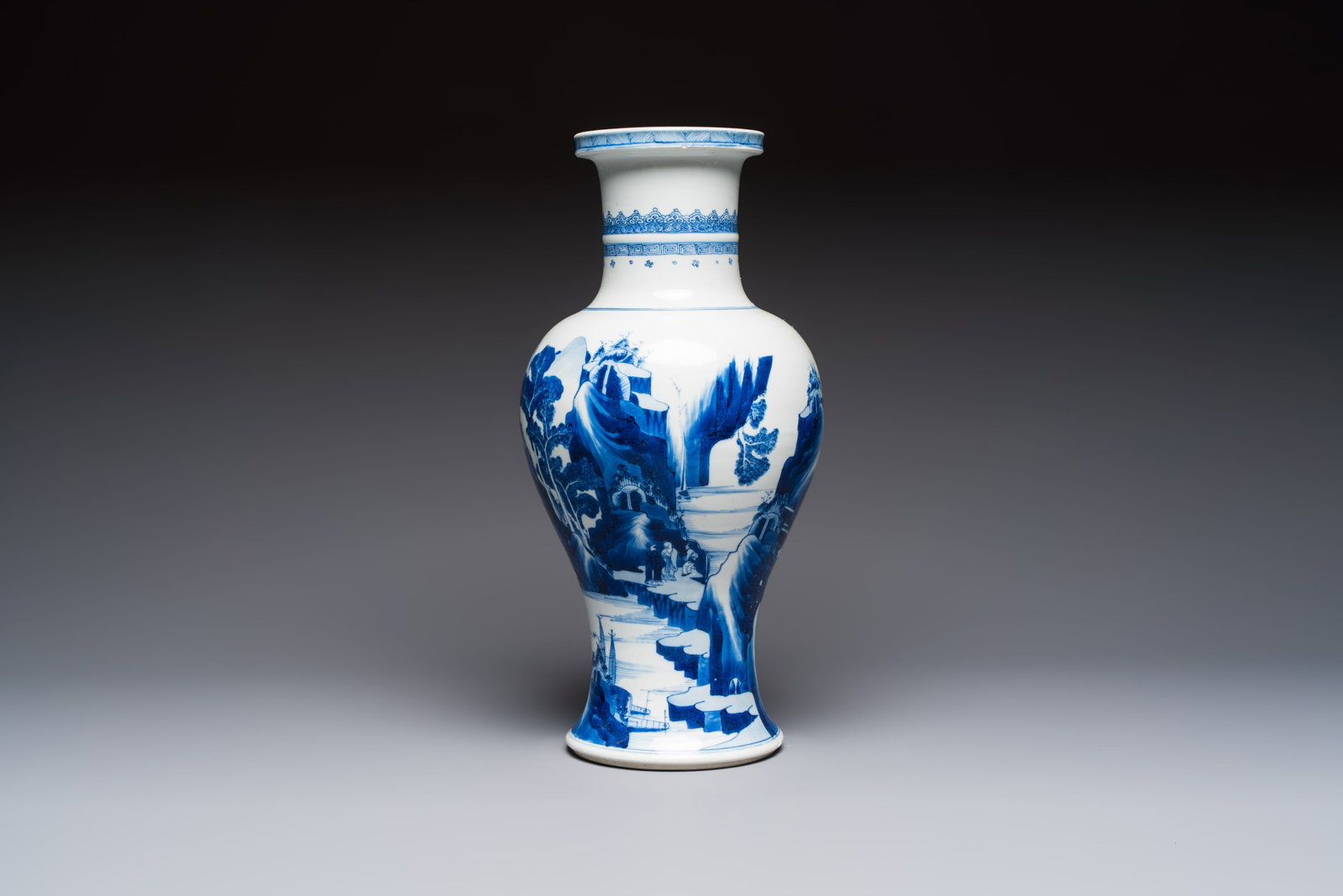 A Chinese blue and white 'Mountainous Riverscape' baluster vase, Kangxi (1 of 6)