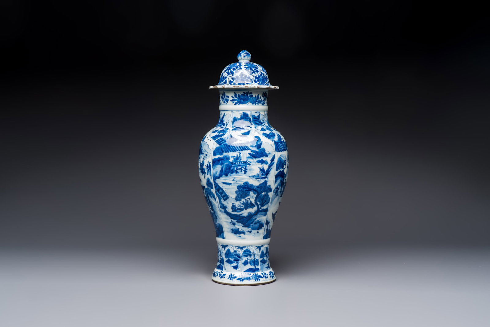 A Chinese blue and white covered vase with figures in landscapes, Kangxi (1 of 6)