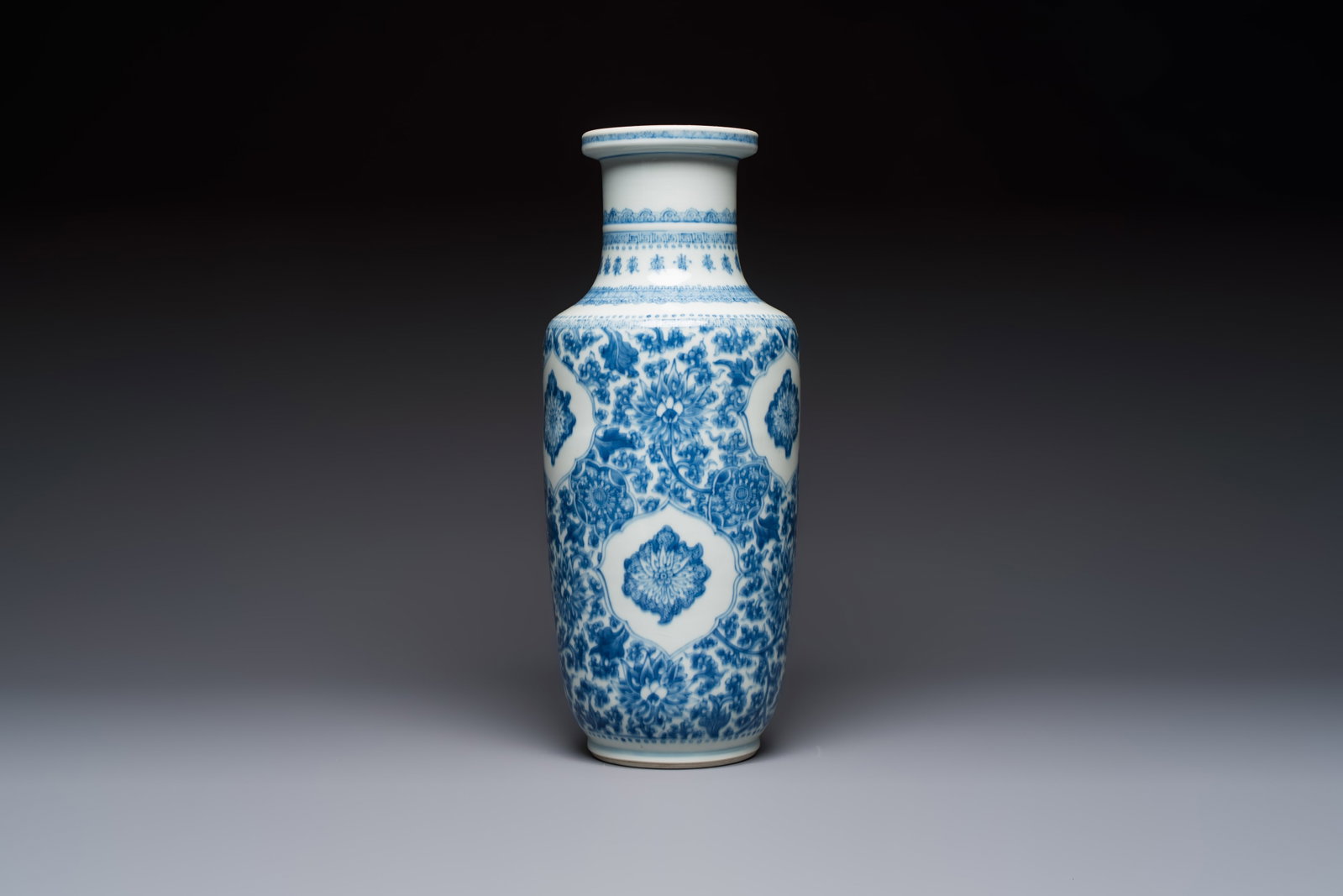 A Chinese blue and white rouleau vase with floral design, Kangxi (1 of 6)