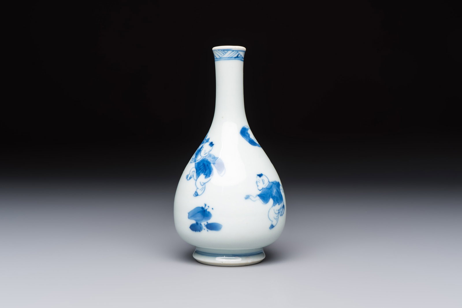 A Chinese blue and white 'Playing Boys' bottle vase, Kangxi (1 of 6)