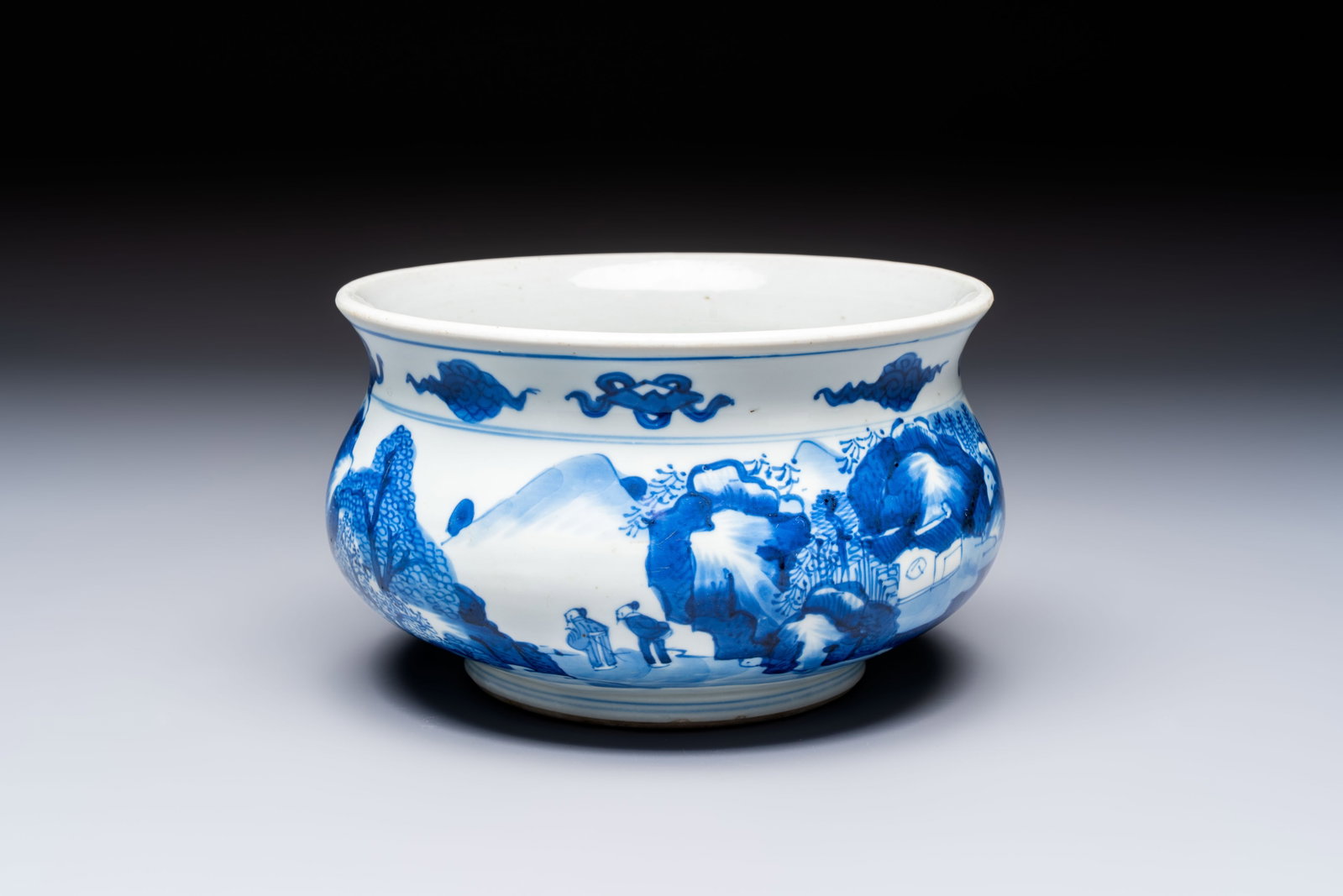 A Chinese blue and white censer depicting two sages in a mountainous landscape, Kangxi: A Chinese blue and white censer depicting two sages in a mountainous landscape, Kangxi Dia.: 20 cm - H.: 12 cm Provenance: - A French private collection, Cannes.