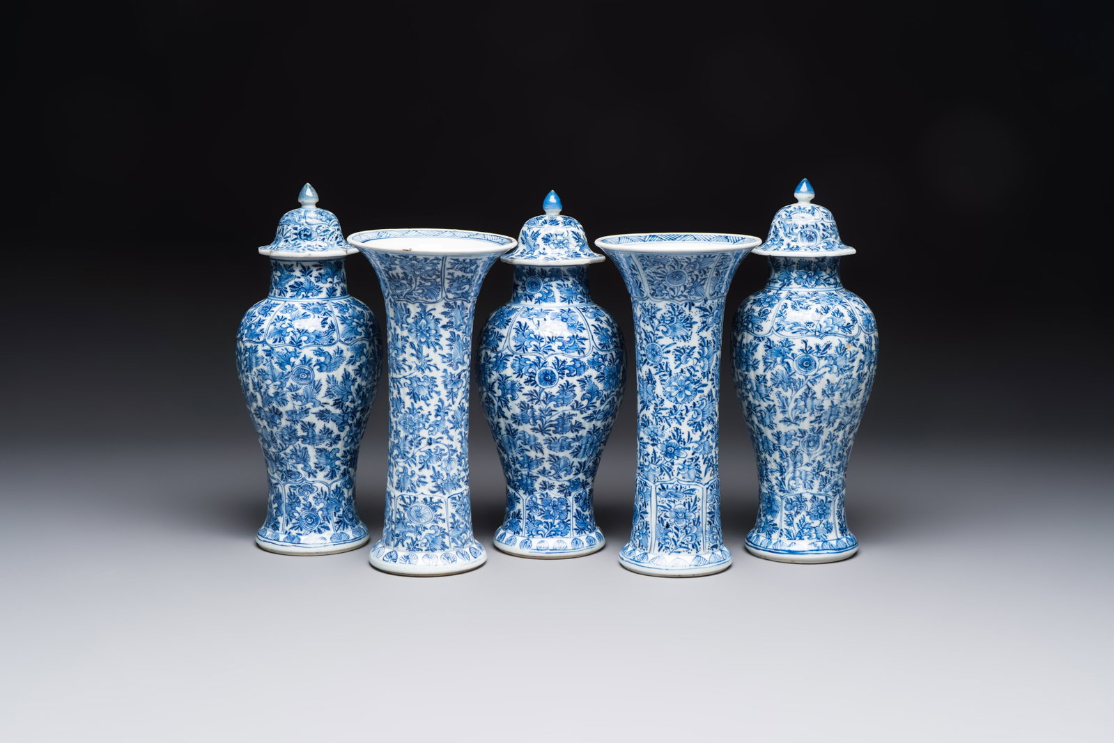A Chinese blue and white five-piece garniture with floral design, Kangxi (1 of 13)