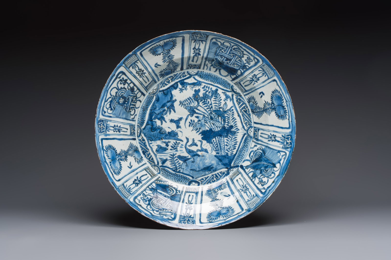 A very large Chinese blue and white 'Kraak' dish with geese by the water, Wanli (1 of 2)