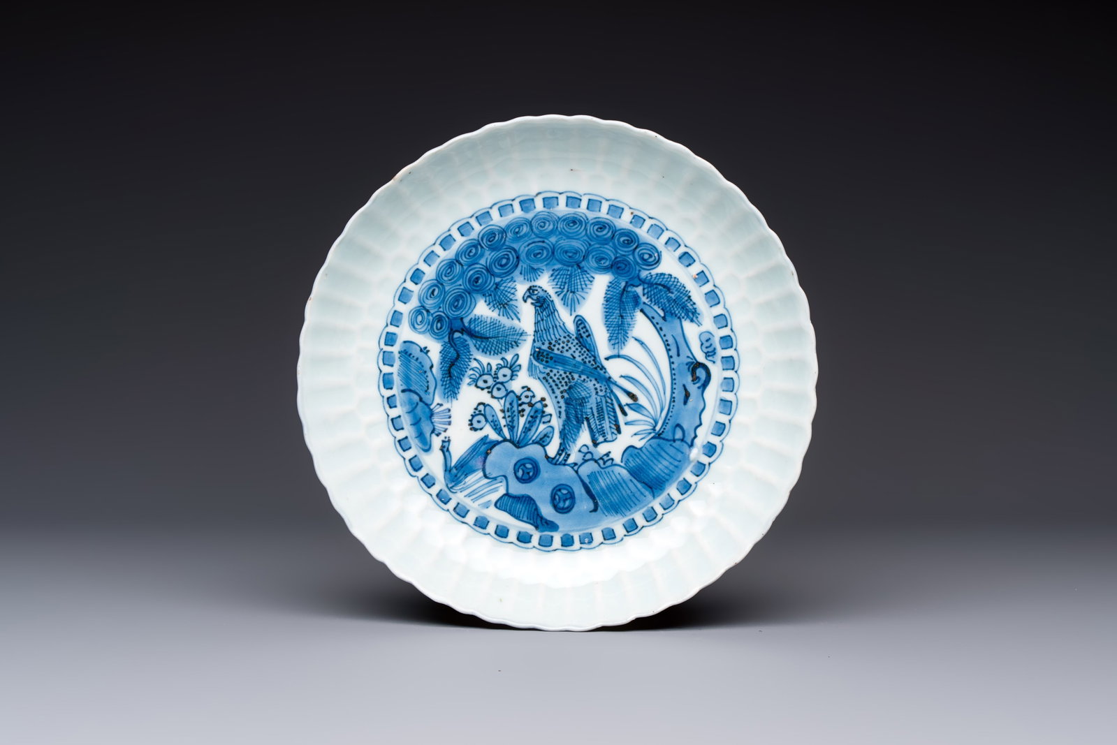 A Chinese blue and white 'Bird of Prey' plate, Wanli (1 of 2)