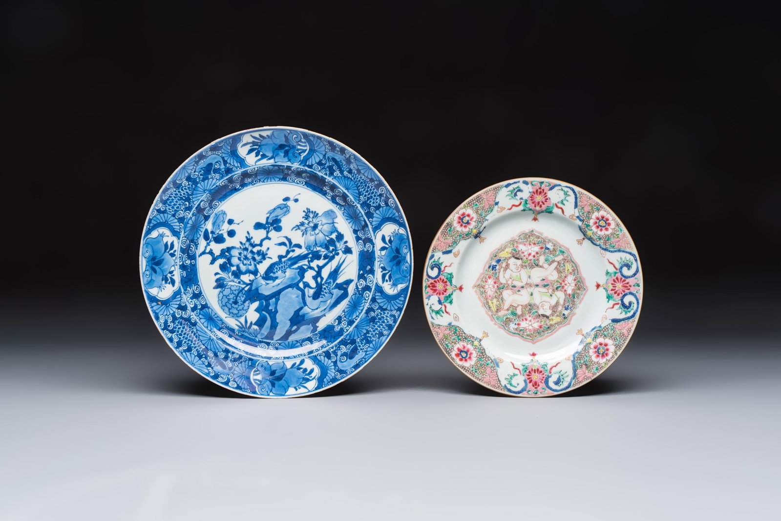 A Chinese blue and white dish with floral design and a famille rose 'HeHe Erxian' plate, (1 of 2)